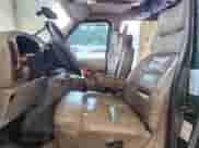 2002 Ford Econoline Cargo Recreational with VIN 1FDRE14L42HB76262, listed as a Copart auction lot 66448265 with 99,825 mi miles and Salvage title. Bid and sale history available at DreamBid. Image 7.