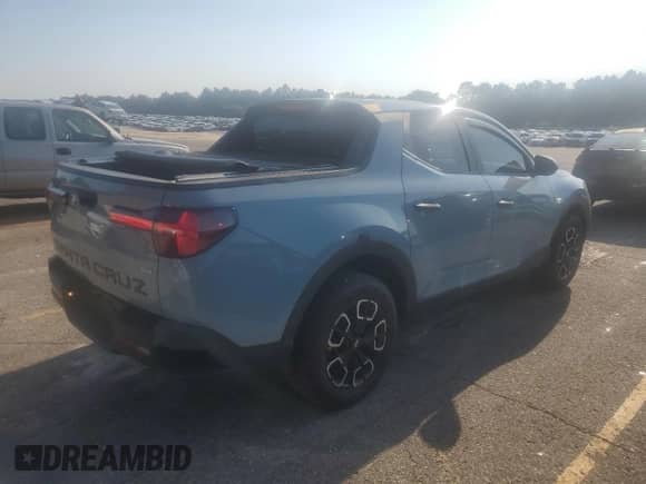 2022 Hyundai Santa Cruz SEL z VIN 5NTJBDAE6NH031670, wystawiony jako Copart lot #80614685 z przebiegiem 59 850 mil mil oraz Czysty tytuł • Clean title. Historia ofert i sprzedaży dostępna na DreamBid. Obrazek 3.