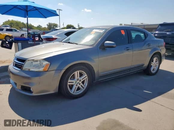 2013 Dodge Avenger SXT with VIN 1C3CDZCGXDN682123, listed as a Copart auction lot 81931835 with 144,236 mi miles and Salvage title. Bid and sale history available at DreamBid. Image 1.