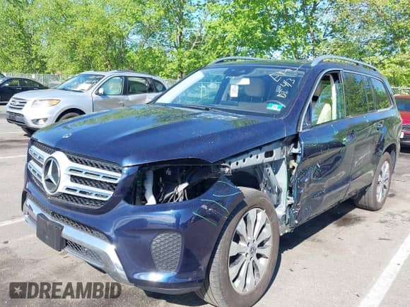 2019 Mercedes-Benz GLS 450 z VIN 4JGDF6EE3KB187387, wystawiony jako IAAI lot #42186786 z przebiegiem 77 740 mil mil oraz . Historia ofert i sprzedaży dostępna na DreamBid. Obrazek 18.