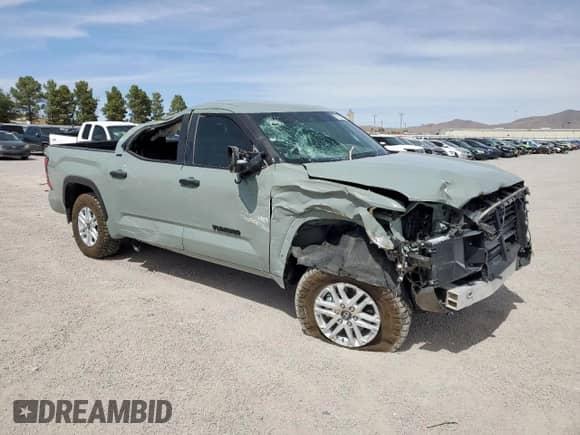 2025 Toyota Tundra SR with VIN 5TFLA5DB4SX257935, listed as a Copart auction lot 57320765 with 6,384 mi miles and Salvage title. Bid and sale history available at DreamBid. Image 4.