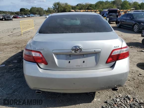 2007 Toyota Camry LE с VIN 4T1BK46K47U524897, выставлен на аукционе Copart как лот 84573195 с пробегом 306 736 миль миль и Списание • Salvage title. История ставок и продаж доступна на DreamBid. Изображение 6.