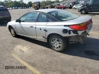 2002 Saturn SC with VIN 1G8ZP12822Z213701, listed as a Copart auction lot 68929934 with 314,042 mi miles and Salvage title. Bid and sale history available at DreamBid. Image 2.