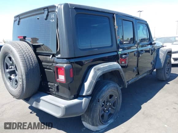 2023 Jeep Wrangler Sport S with VIN 1C4HJXDG7PW617662, listed as a IAAI auction lot 42725503 with Not provided miles and . Bid and sale history available at DreamBid. Image 4.