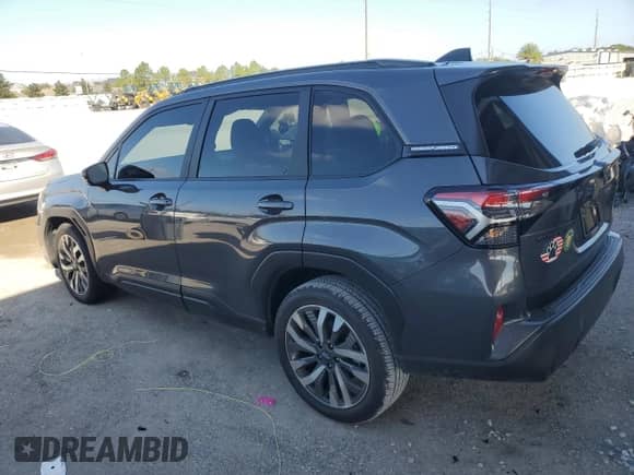 2025 Subaru Forester Touring z VIN JF2SLDTC1SH500073, wystawiony jako Copart lot #84433385 z przebiegiem 4 997 mil mil oraz Szkoda całkowita • Salvage title. Historia ofert i sprzedaży dostępna na DreamBid. Obrazek 2.