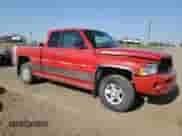 2000 Dodge 1500 with VIN 1B7HF13Z9YJ133220, listed as a Copart auction lot 80389065 with 286,363 mi miles and Salvage title. Bid and sale history available at DreamBid. Image 4.