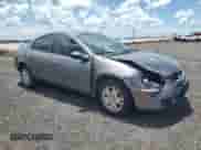 2005 Dodge Neon SXT z VIN 1B3ES56C95D237635, wystawiony jako Copart lot #66286485 z przebiegiem 190 521 mil mil oraz Szkoda całkowita • Salvage title. Historia ofert i sprzedaży dostępna na DreamBid. Obrazek 4.