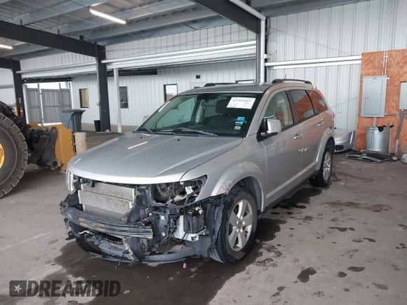 2012 Dodge Journey SXT z VIN 3C4PDDBG1CT205905, wystawiony jako IAAI lot #43351815 z przebiegiem 148 244 mil mil oraz . Historia ofert i sprzedaży dostępna na DreamBid. Obrazek 6.