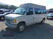 2002 Ford Econoline Cargo with VIN 1FTNE242X2HA90857, listed as a IAAI auction lot 42716391 with 103,796 mi miles and . Bid and sale history available at DreamBid. Image 2.