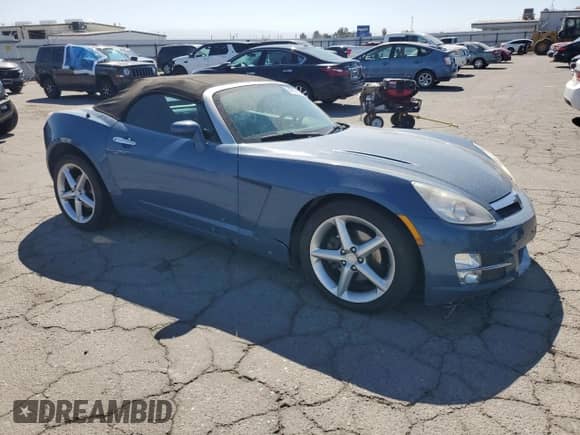 2007 Saturn Sky with VIN 1G8MB35BX7Y123687, listed as a Copart auction lot 84660365 with 48,427 mi miles and Salvage title. Bid and sale history available at DreamBid. Image 4.