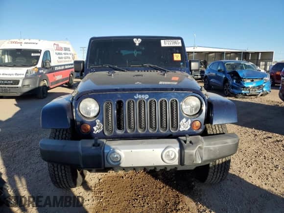 2013 Jeep Wrangler Moab with VIN 1C4AJWBG5DL581515, listed as a Copart auction lot 87225965 with 122,263 mi miles and Salvage title. Bid and sale history available at DreamBid. Image 5.