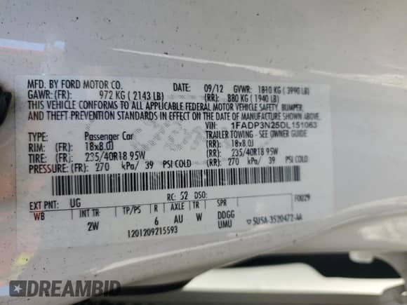 2013 Ford Focus Titanium z VIN 1FADP3N25DL151063, wystawiony jako Copart lot #84240975 z przebiegiem 154 686 mil mil oraz Szkoda całkowita • Salvage title. Historia ofert i sprzedaży dostępna na DreamBid. Obrazek 13.