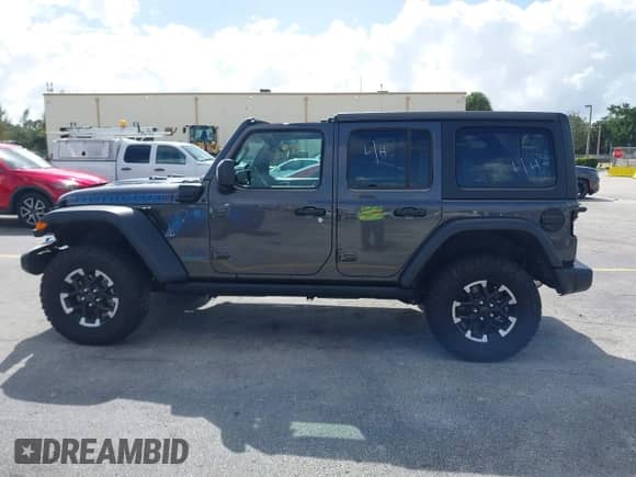 2024 Jeep Wrangler Rubicon with VIN 1C4RJXR6XRW240302, listed as a IAAI auction lot 40772081 with Not provided miles and . Bid and sale history available at DreamBid. Image 14.