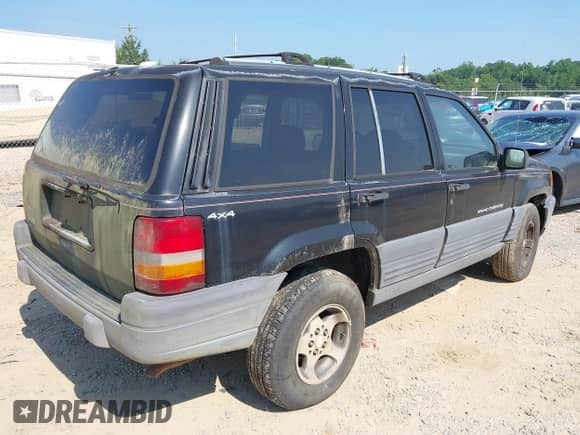 1996 Jeep Grand Cherokee Laredo z VIN 1J4GZ58SXTC280868, wystawiony jako IAAI lot #42653608 z przebiegiem 188 867 mil mil oraz . Historia ofert i sprzedaży dostępna na DreamBid. Obrazek 4.