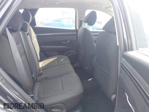 2022 Hyundai Tucson SE with VIN 5NMJA3AEXNH021457, listed as a IAAI auction lot 42775004 with 58,986 mi miles and . Bid and sale history available at DreamBid. Image 8.