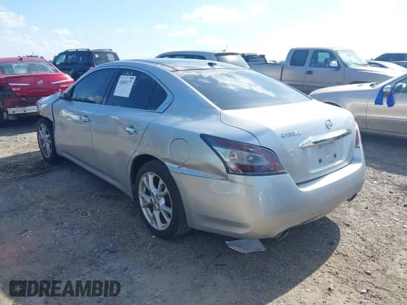 2014 Nissan Maxima SV z VIN 1N4AA5AP1EC455171, wystawiony jako IAAI lot #42603177 z przebiegiem 181 619 mil mil oraz . Historia ofert i sprzedaży dostępna na DreamBid. Obrazek 3.