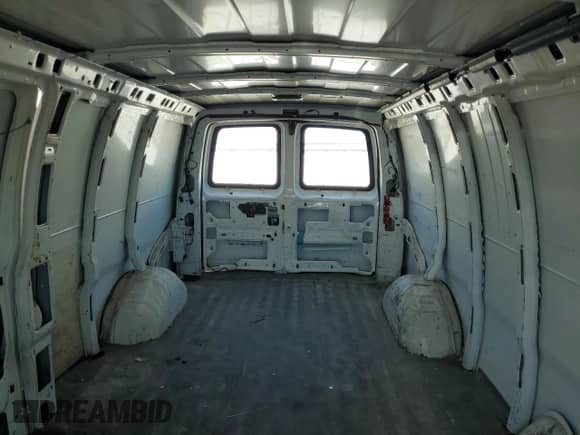 2013 Chevrolet Express Cargo z VIN 1GCWGGFA0D1109475, wystawiony jako Copart lot #69848905 z przebiegiem 172 728 mil mil oraz Szkoda całkowita • Salvage title. Historia ofert i sprzedaży dostępna na DreamBid. Obrazek 10.