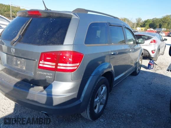 2010 Dodge Journey SXT with VIN 3D4PG5FVXAT148013, listed as a IAAI auction lot 43487466 with 109,732 mi miles and . Bid and sale history available at DreamBid. Image 4.