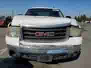 2007 GMC Sierra 1500 SLE1 with VIN 1GTEC19C87Z570530, listed as a Copart auction lot 60296765 with 215,143 mi miles and Salvage title. Bid and sale history available at DreamBid. Image 5.