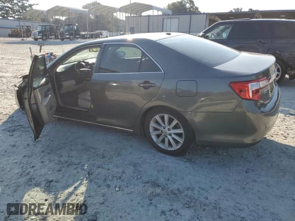 2013 Toyota Camry XLE with VIN 4T1BD1FK6DU090387, listed as a Copart auction lot 80391335 with 242,577 mi miles and Salvage title. Bid and sale history available at DreamBid. Image 2.