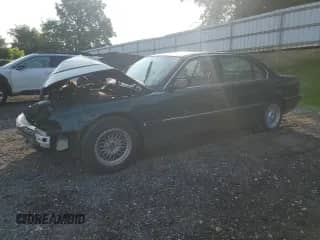 1998 BMW 7 Series 740iL with VIN WBAGJ8324WDM18728, listed as a Copart auction lot 60032015 with Not provided miles and Salvage title. Bid and sale history available at DreamBid. Image 1.