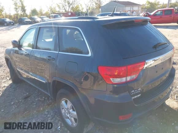 2011 Jeep Grand Cherokee Laredo z VIN 1J4RR4GG7BC530081, wystawiony jako IAAI lot #43404273 z przebiegiem 159 811 mil mil oraz . Historia ofert i sprzedaży dostępna na DreamBid. Obrazek 3.