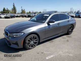 2020 BMW 3 Series 330i with VIN WBA5R1C02LFH34363, listed as a Copart auction lot 64111014 with 90,555 mi miles and Salvage title. Bid and sale history available at DreamBid. Image 1.