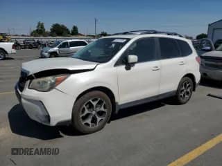 2014 Subaru Forester XT Premium with VIN JF2SJGDC0EH503525, listed as a Copart auction lot 69170735 with 213,928 mi miles and Salvage title. Bid and sale history available at DreamBid. Image 1.