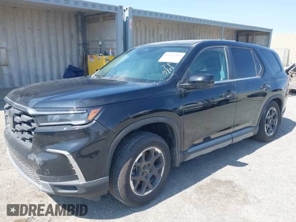 2025 Honda Pilot EX-L с VIN 5FNYG2H49SB002979, выставлен на аукционе IAAI как лот 42571340 с пробегом 10 598 миль миль и . История ставок и продаж доступна на DreamBid. Изображение 17.