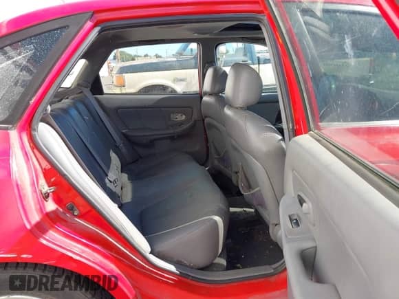 2005 Hyundai Elantra GLS z VIN KMHDN56D85U156888, wystawiony jako IAAI lot #43301903 z przebiegiem Nie podano mil oraz . Historia ofert i sprzedaży dostępna na DreamBid. Obrazek 8.