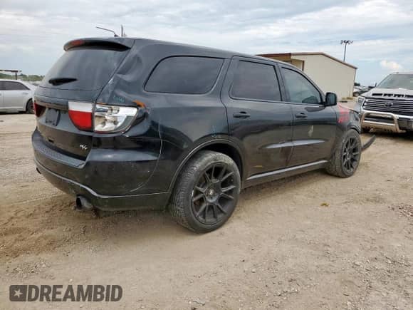 2013 Dodge Durango R/T with VIN 1C4SDHCT3DC697685, listed as a Copart auction lot 66028745 with 148,454 mi miles and Salvage title. Bid and sale history available at DreamBid. Image 3.