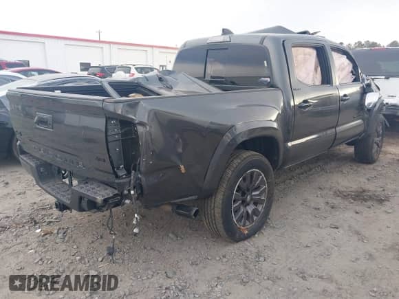 2022 Toyota Tacoma Limited with VIN 3TMGZ5AN4NM526146, listed as a IAAI auction lot 41214189 with 19,771 mi miles and . Bid and sale history available at DreamBid. Image 4.