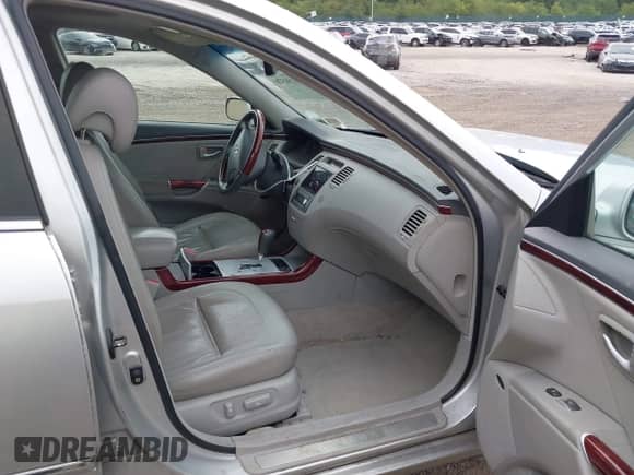 2007 Hyundai Azera SE with VIN KMHFC46F67A164812, listed as a IAAI auction lot 43286570 with 164,641 mi miles and . Bid and sale history available at DreamBid. Image 5.