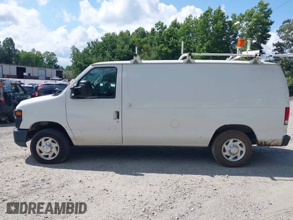 2014 Ford Econoline Cargo Commercial with VIN 1FTNE1EW8EDA98589, listed as a IAAI auction lot 42529081 with 186,595 mi miles and . Bid and sale history available at DreamBid. Image 14.