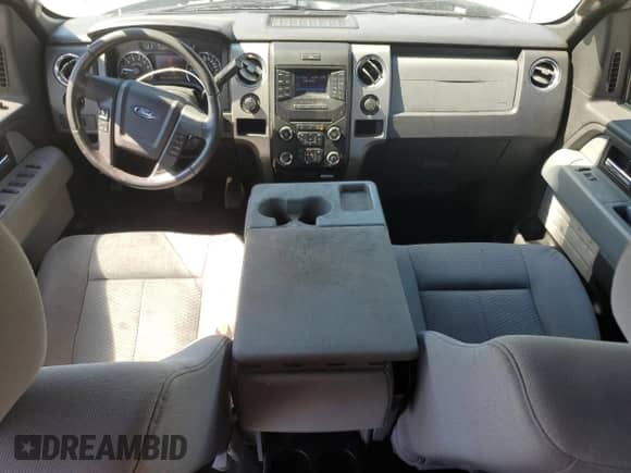 2013 Ford F-150 XLT с VIN 1FTFW1ET8DFA50018, выставлен на аукционе Copart как лот 80842835 с пробегом 241 595 миль миль и Списание • Salvage title. История ставок и продаж доступна на DreamBid. Изображение 8.