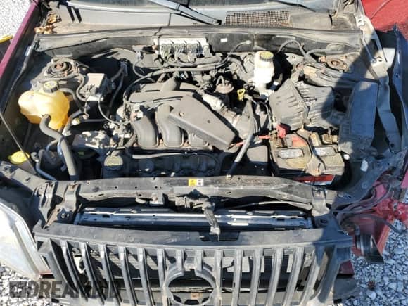 2008 Mercury Mariner Premier with VIN 4M2CU97128KJ45782, listed as a Copart auction lot 80001145 with 124,898 mi miles and Salvage title. Bid and sale history available at DreamBid. Image 11.