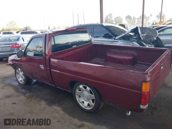 1994 Nissan Frontier with VIN 1N6SD11S8RC306682, listed as a IAAI auction lot 41725950 with 169,022 mi miles and . Bid and sale history available at DreamBid. Image 14.