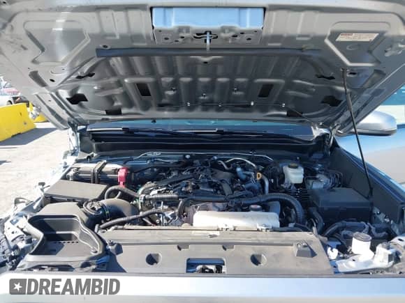 2024 Toyota Tacoma SR5 z VIN 3TMLB5JN5RM039515, wystawiony jako IAAI lot #42416031 z przebiegiem 10 900 mil mil oraz . Historia ofert i sprzedaży dostępna na DreamBid. Obrazek 10.