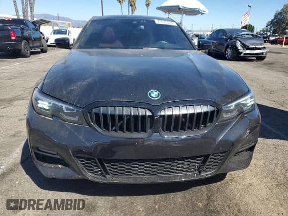 2022 BMW 3 Series 330e with VIN 3MW5P7J08N8C52016, listed as a Copart auction lot 71670335 with 34,644 mi miles and Salvage title. Bid and sale history available at DreamBid. Image 5.