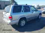 2002 Nissan Pathfinder SE with VIN JN8DR09Y72W733098, listed as a IAAI auction lot 43239221 with 236,085 mi miles and . Bid and sale history available at DreamBid. Image 4.