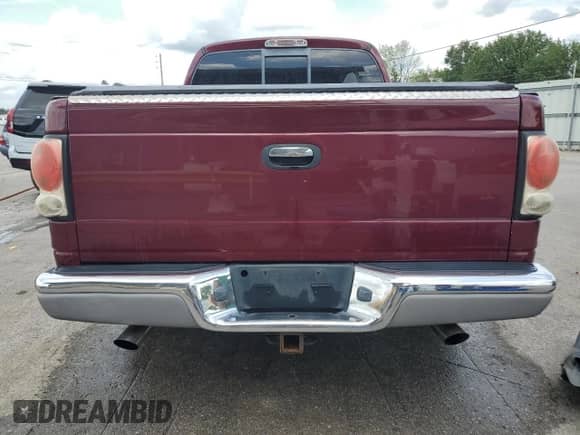 2002 Dodge Dakota SLT with VIN 1B7HL48N42S702413, listed as a Copart auction lot 65515795 with 182,211 mi miles and Salvage title. Bid and sale history available at DreamBid. Image 6.