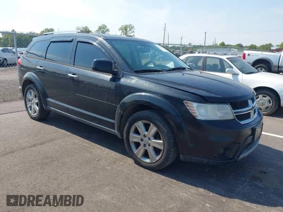 2012 Dodge Journey Crew with VIN 3C4PDCDG4CT231468, listed as a IAAI auction lot 43178465 with 250,483 mi miles and . Bid and sale history available at DreamBid. Image 1.