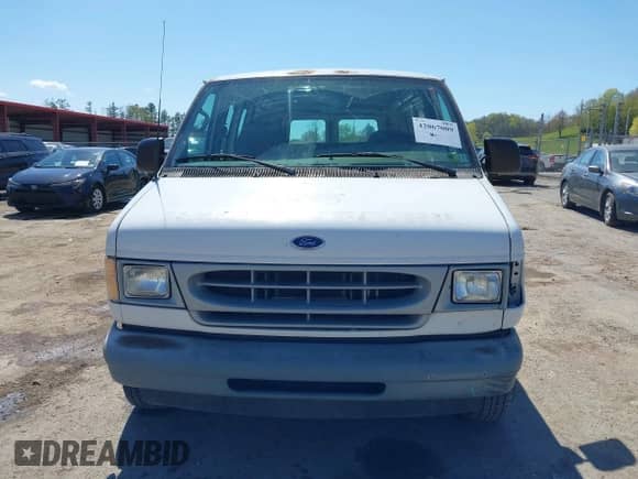 2002 Ford Econoline Cargo with VIN 1FTRE14252HB78677, listed as a IAAI auction lot 42067009 with 134,596 mi miles and . Bid and sale history available at DreamBid. Image 12.
