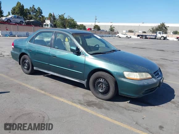 2002 Honda Accord LX with VIN 1HGCG56482A045234, listed as a IAAI auction lot 42884707 with 174,019 mi miles and . Bid and sale history available at DreamBid. Image 1.