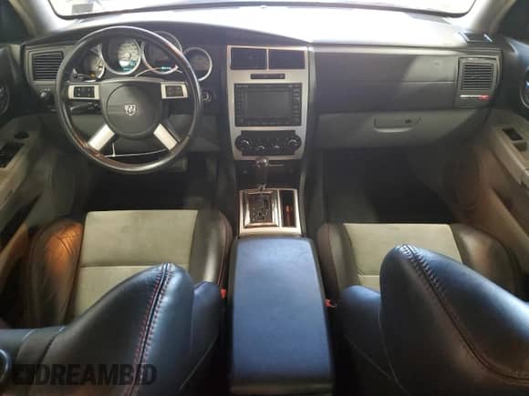 2007 Dodge Charger SRT-8 with VIN 2B3KA73W67H652417, listed as a Copart auction lot 70518705 with 75,440 mi miles and Salvage title. Bid and sale history available at DreamBid. Image 8.