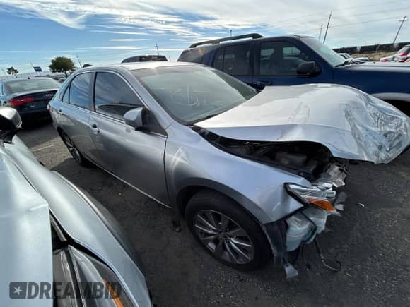 2015 Toyota Camry LE с VIN 4T1BD1FK4FU160911, выставлен на аукционе Copart как лот 71867615 с пробегом 339 207 миль миль и Списание • Salvage title. История ставок и продаж доступна на DreamBid. Изображение 4.