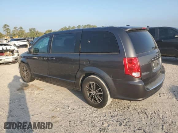 2019 Dodge Grand Caravan GT with VIN 2C4RDGEG7KR591141, listed as a Copart auction lot 87183115 with 104,814 mi miles and Salvage title. Bid and sale history available at DreamBid. Image 2.