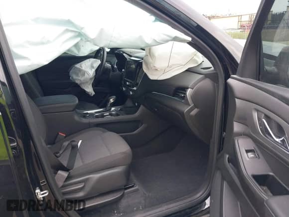 2023 Chevrolet Traverse LT Cloth z VIN 1GNERGKW6PJ220745, wystawiony jako IAAI lot #42485387 z przebiegiem 24 715 mil mil oraz . Historia ofert i sprzedaży dostępna na DreamBid. Obrazek 5.