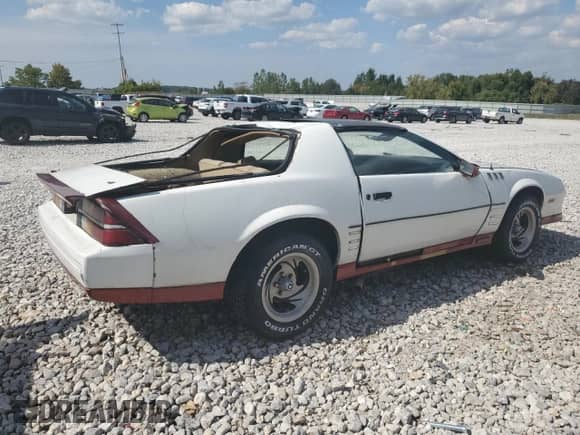 1984 Chevrolet Camaro Z28 Sport с VIN 1G1AP87GXEN189972, выставлен на аукционе Copart как лот 71603385 с пробегом 666 799 миль миль и Чистый • Clean title. История ставок и продаж доступна на DreamBid. Изображение 3.