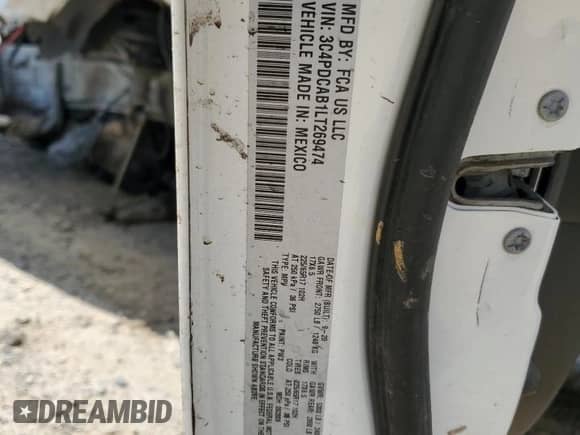 2020 Dodge Journey SE Value with VIN 3C4PDCAB1LT269474, listed as a Copart auction lot 69734325 with Not provided miles and Salvage title. Bid and sale history available at DreamBid. Image 13.